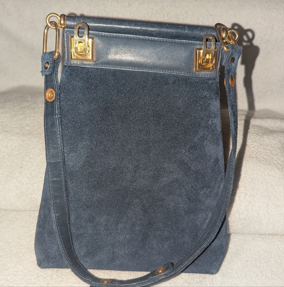 Vintage GiGi handbags blue suede with leather details.